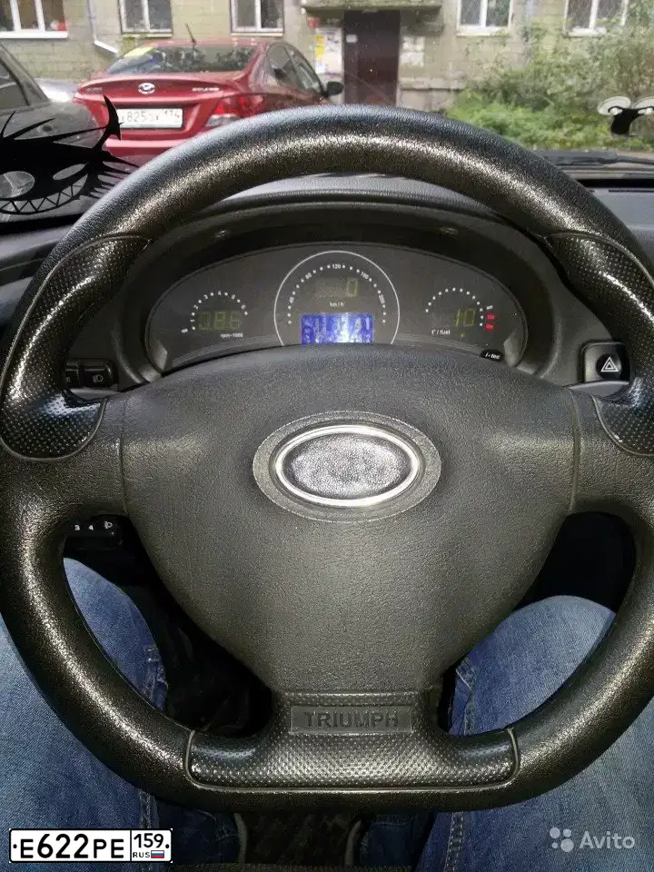 Фото автомобиля LADA 2112, 2008 — госномер Е215НС196. Цвет: ЧЕРНЫЙ