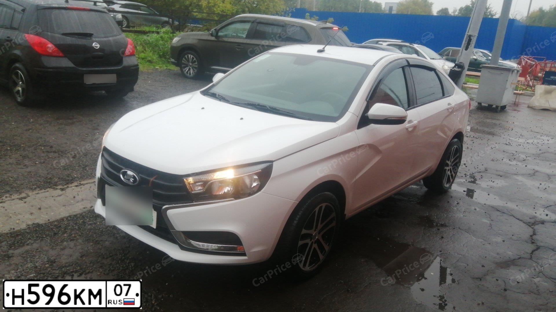 Фото автомобиля LADA VESTA, 2018 — госномер В456МУ799. Цвет: Белый