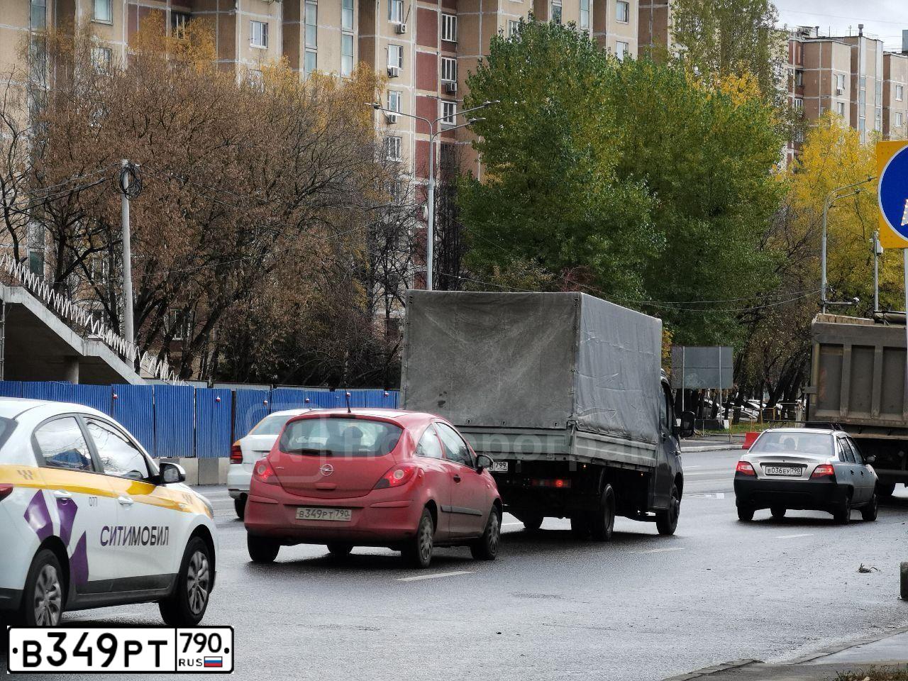 Фото автомобиля OPEL CORSA, 2007 — госномер В349РТ790. Цвет: КРАСНЫЙ ЧЕРНЫЙ