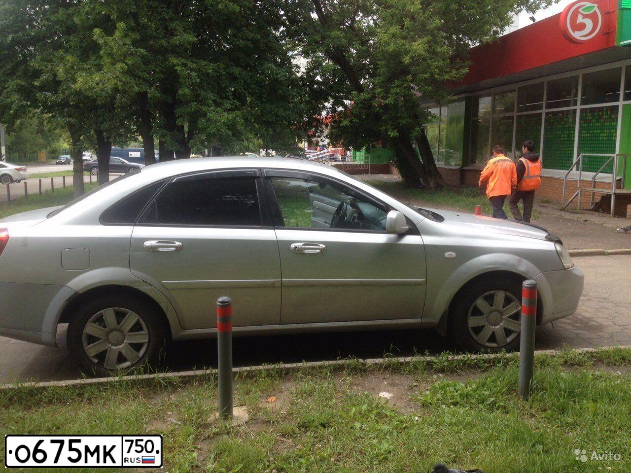 Фото автомобиля CHEVROLET LACETTI, 2012 — госномер Р764КР70. Цвет: БЕЛЫЙ ЧЕРНЫЙ