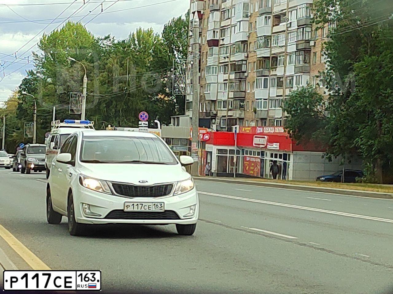 Фото автомобиля KIA RIO, 2012 — госномер К221ТО164. Цвет: Белый