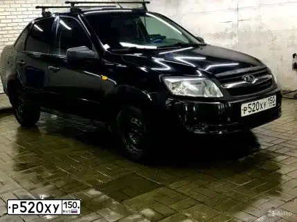Фото автомобиля VAZ 2190 GRANTA, 2013 — госномер А115СА92. Цвет: Сине-Черный