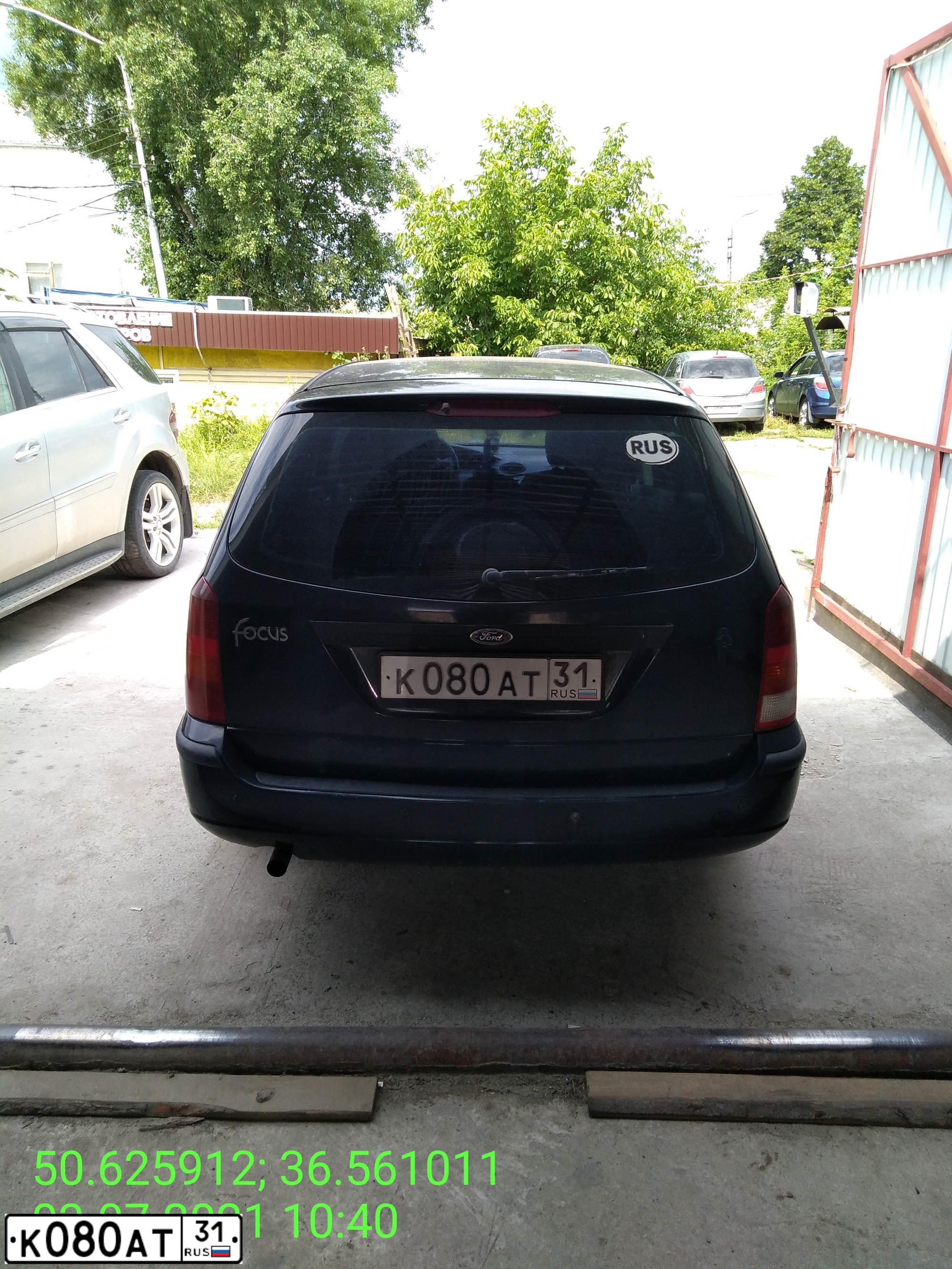 Фото автомобиля FORD FOCUS, 2003 — госномер К080АТ31. Цвет: Темно-синий