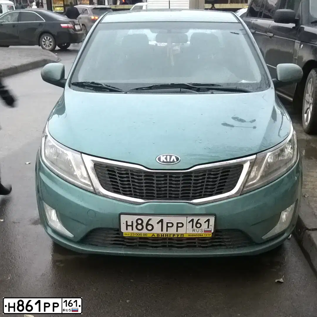 Фото автомобиля KIA RIO, 2013 — госномер Н861РР161. Цвет: СВЕТЛО-ЗЕЛЕНЫЙ