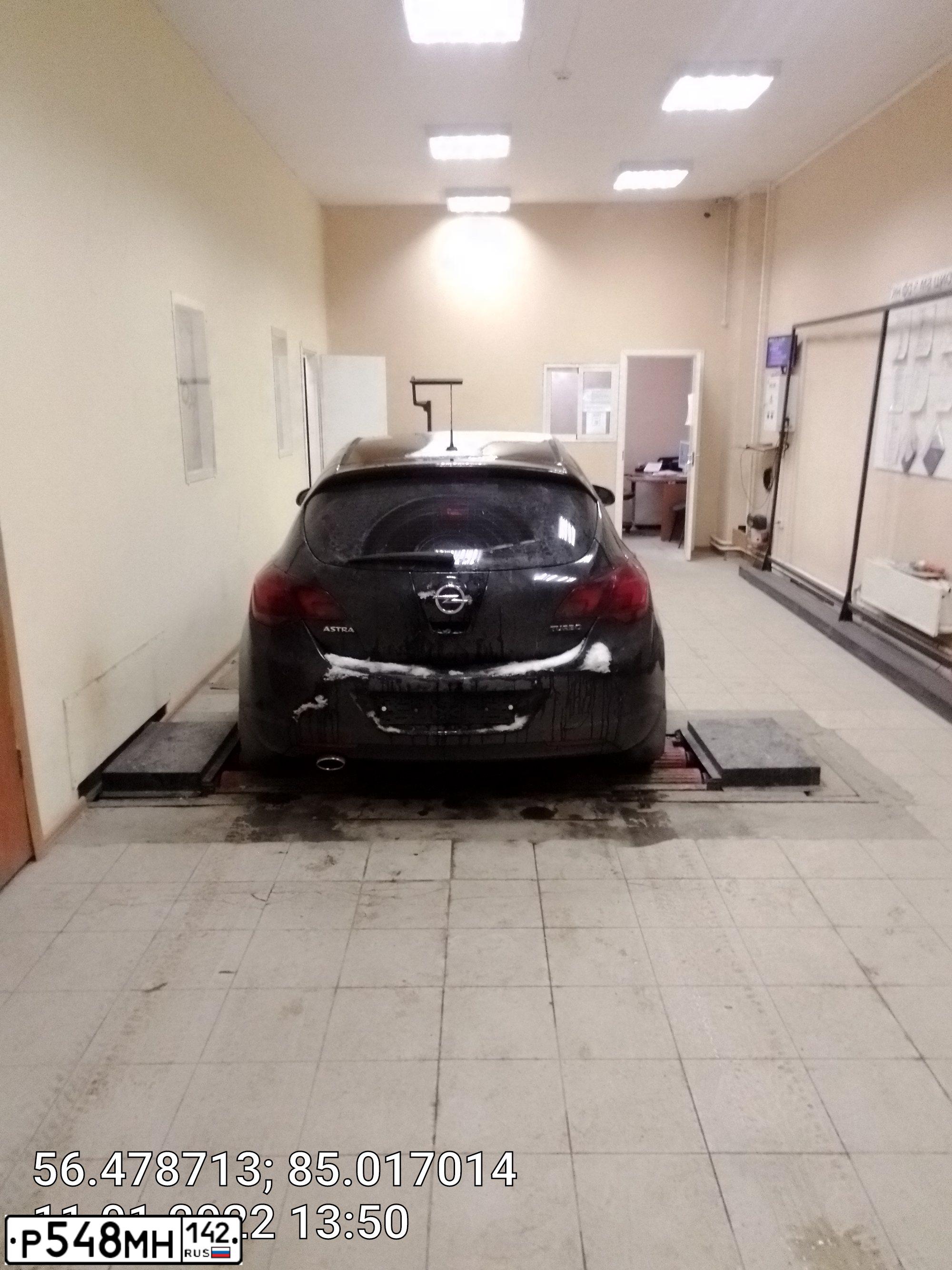 Фото автомобиля OPEL ASTRA, 2011 — госномер К039АТ70. Цвет: ЧЕРНЫЙ