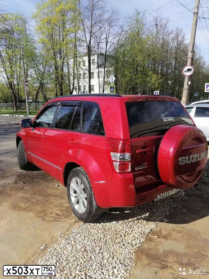 Фото автомобиля SUZUKI /GRAND/ VITARA, 2012 — госномер Х503ХТ750. Цвет: Красный