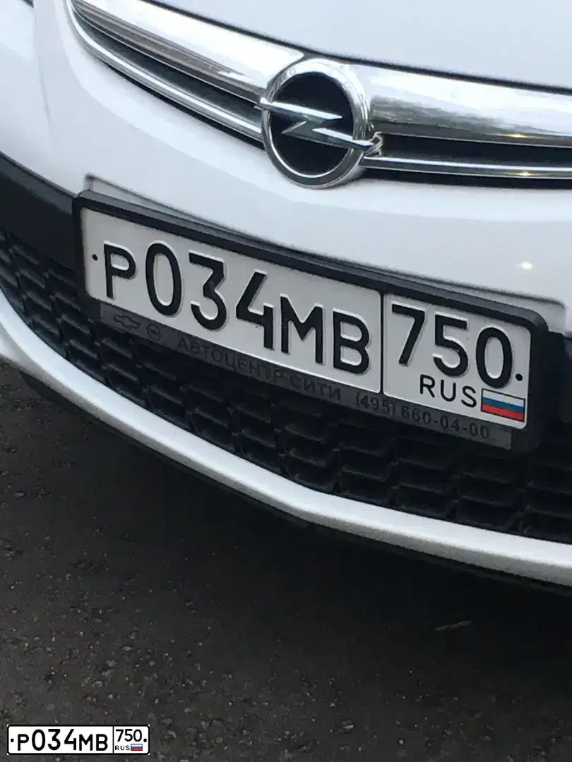 Фото автомобиля OPEL ASTRA, 2014 — госномер Р034МВ750. Цвет: Белый