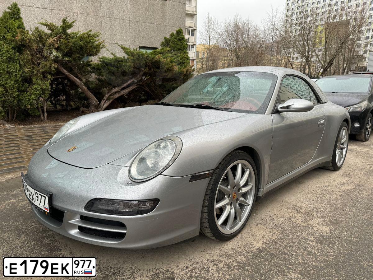 Фото автомобиля PORSCHE 911 CARRERA, 2008 — госномер Х958ВС977. Цвет: СЕРЫЙ