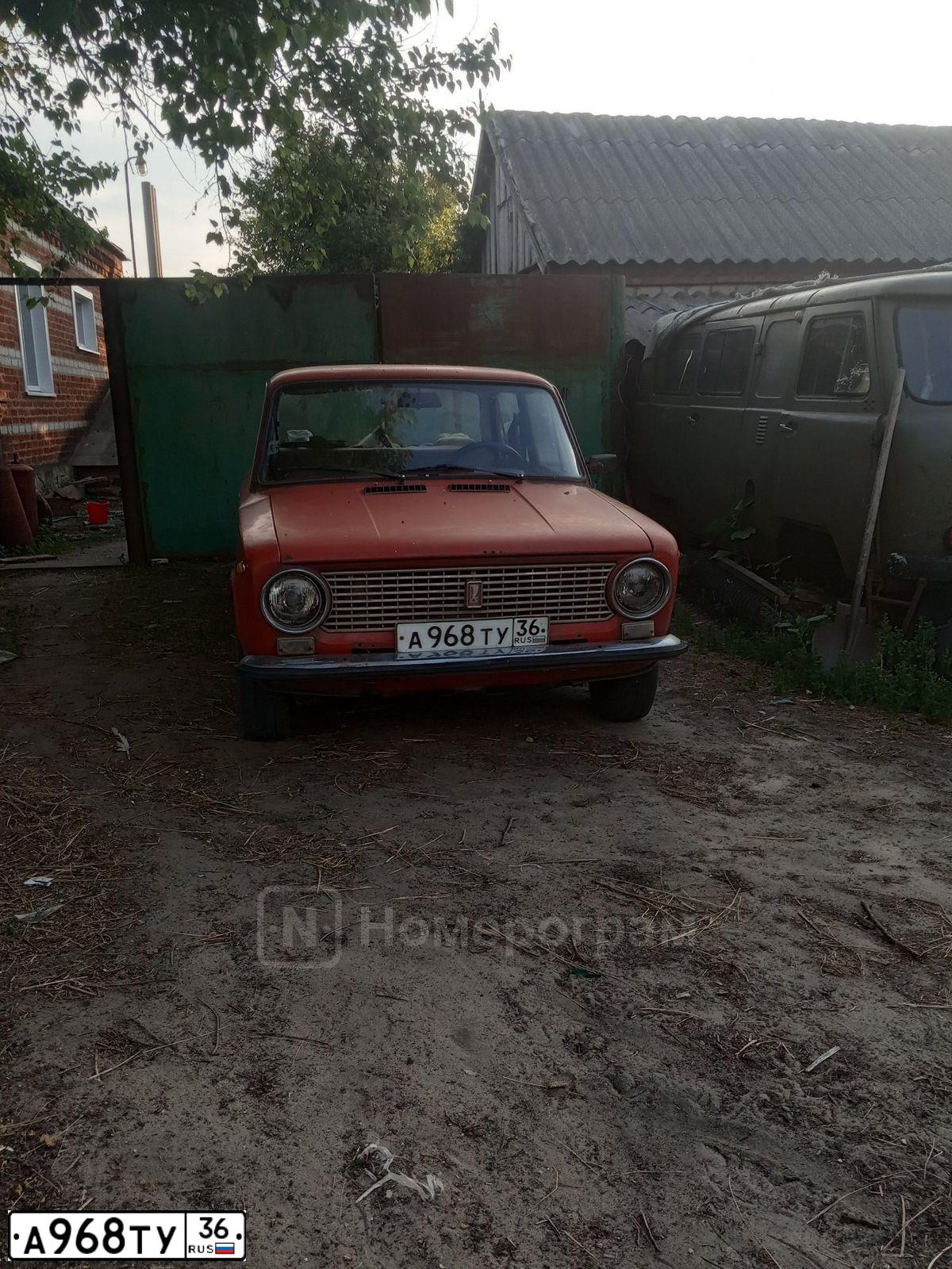 Фото автомобиля LADA 2101, 1983 — госномер А968ТУ36. Цвет: КРАСНО-ОРАНЖЕВЫЙ