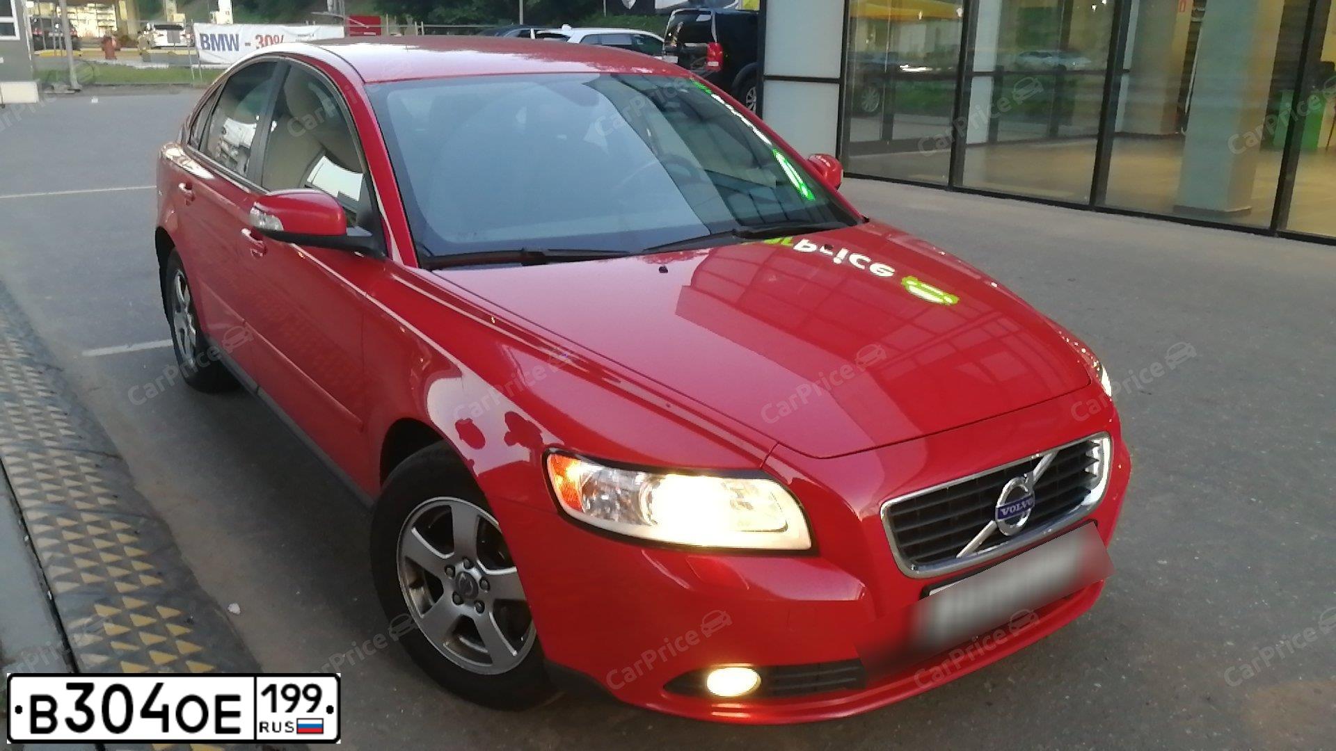 Фото автомобиля VOLVO S40, 2008 — госномер Н240АС777. Цвет: Красный