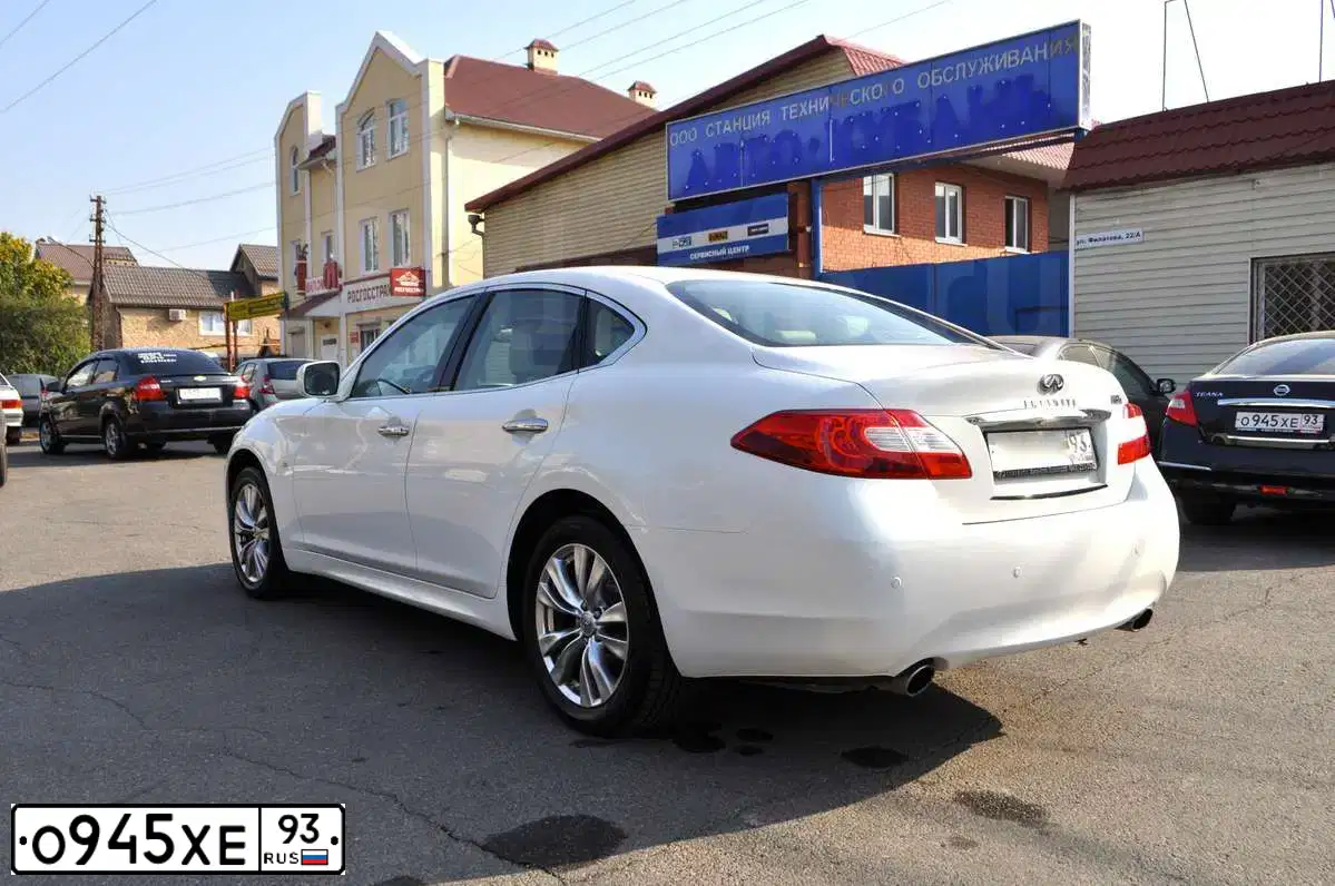 Фото автомобиля NISSAN TEANA, 2008 — госномер О945ХЕ93. Цвет: ЧЕРНЫЙ
