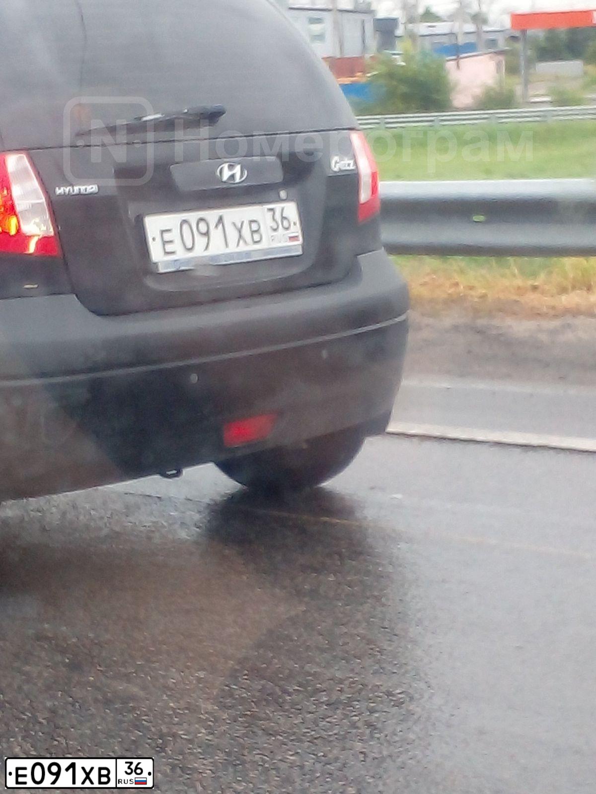 Фото автомобиля HYUNDAI GETZ, 2008 — госномер Е091ХВ36. Цвет: ЧЕРНЫЙ