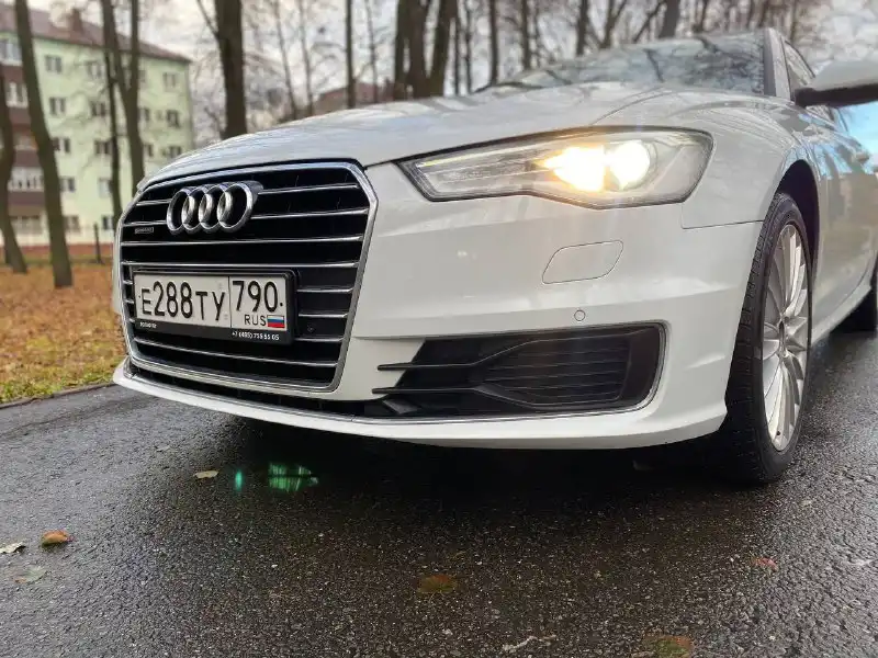 Фото автомобиля AUDI A6, 2016 — госномер Е288ТУ790. Цвет: Белый