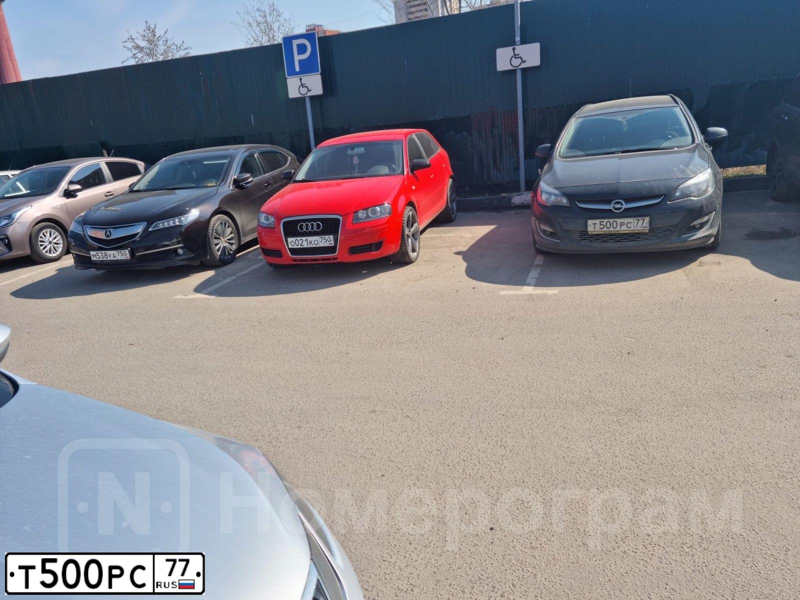 Фото автомобиля OPEL ASTRA, 2012 — госномер Т500РС77. Цвет: ЧЕРНЫЙ