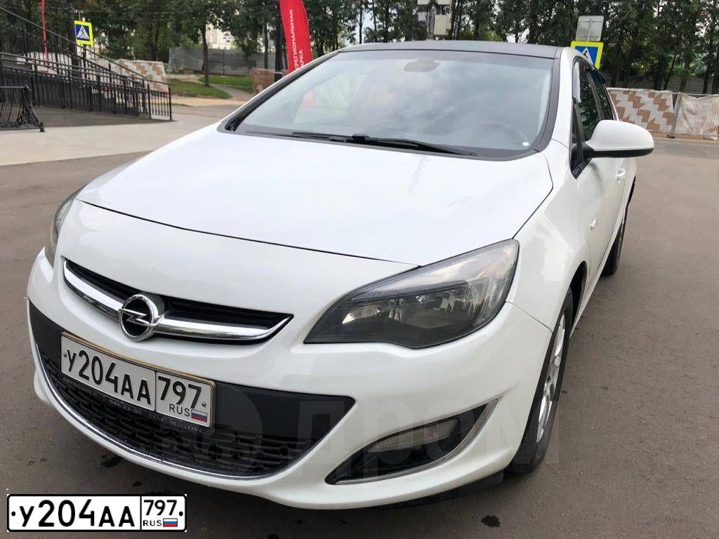 Фото автомобиля OPEL ASTRA, 2012 — госномер Н783УТ32. Цвет: Белый