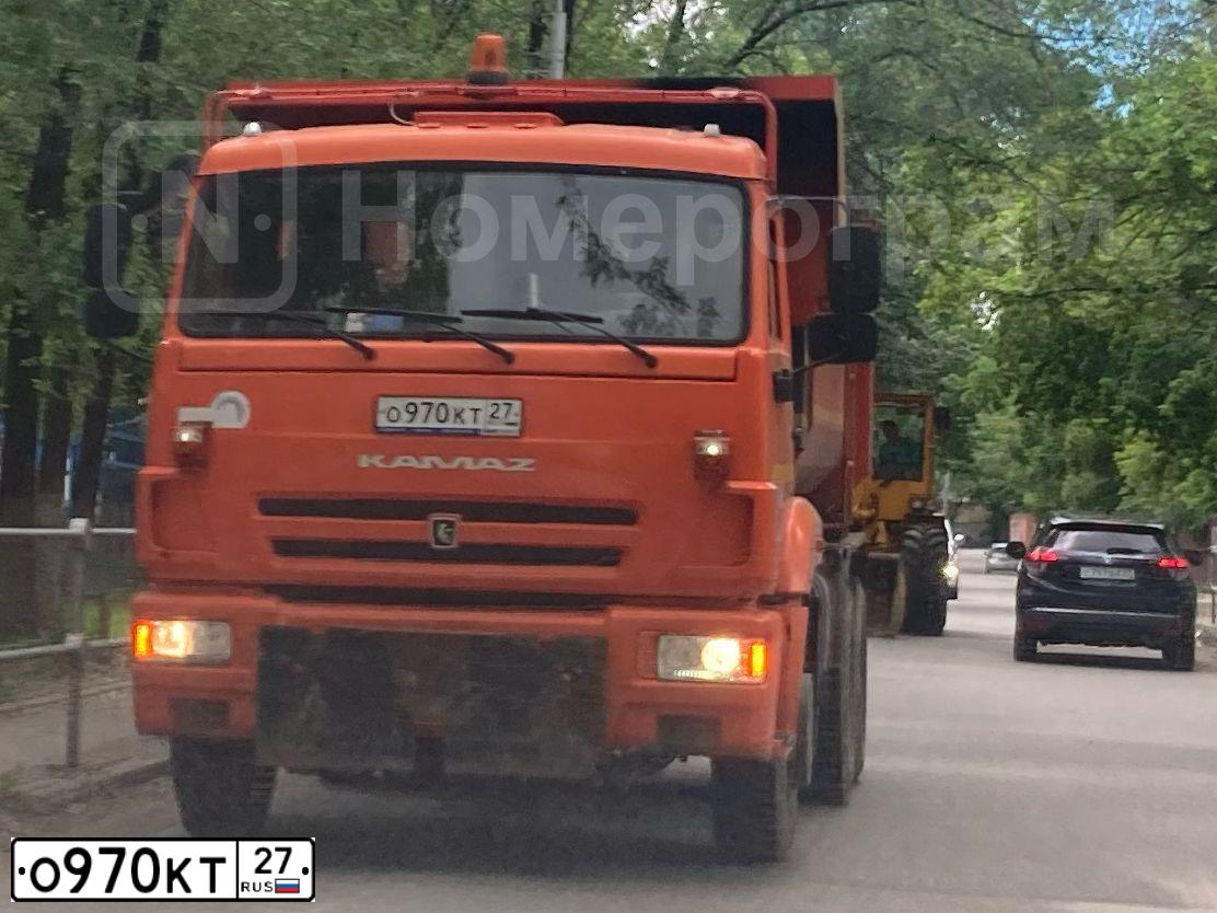 Фото автомобиля KAMAZ 65115 /6X4/, 2018 — госномер О970КТ27. Цвет: Оранжевый RAL 2009
