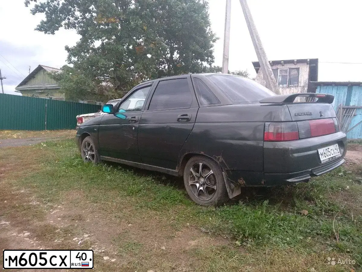 Фото автомобиля LADA 2110, 2004 — госномер М605СХ40. Цвет: ЗОЛОТИСТЫЙ ТЕМНО-ЗЕЛЕНЫЙ