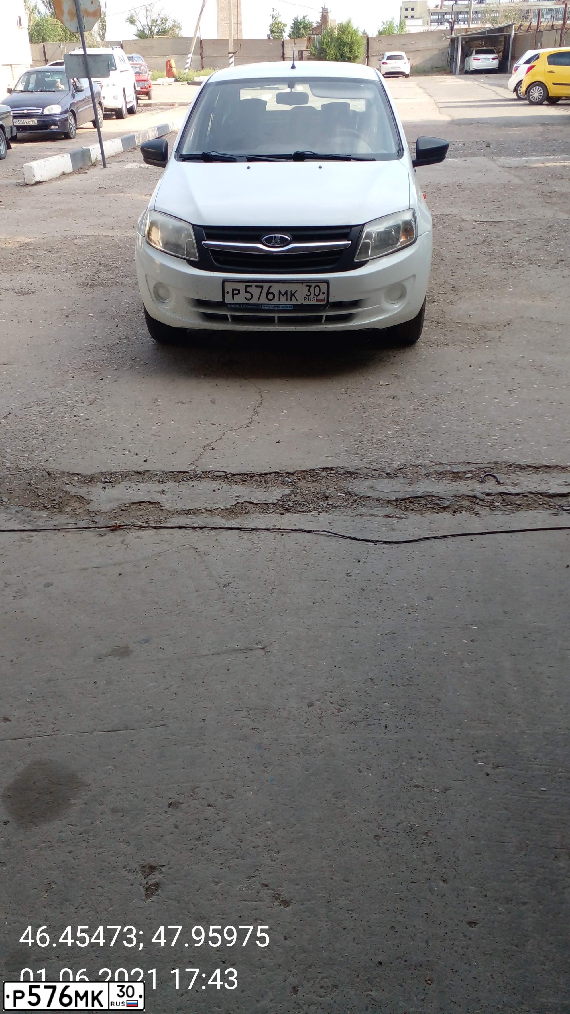 Фото автомобиля LADA 2190 GRANTA, 2015 — госномер С696ЕЕ05. Цвет: Белый