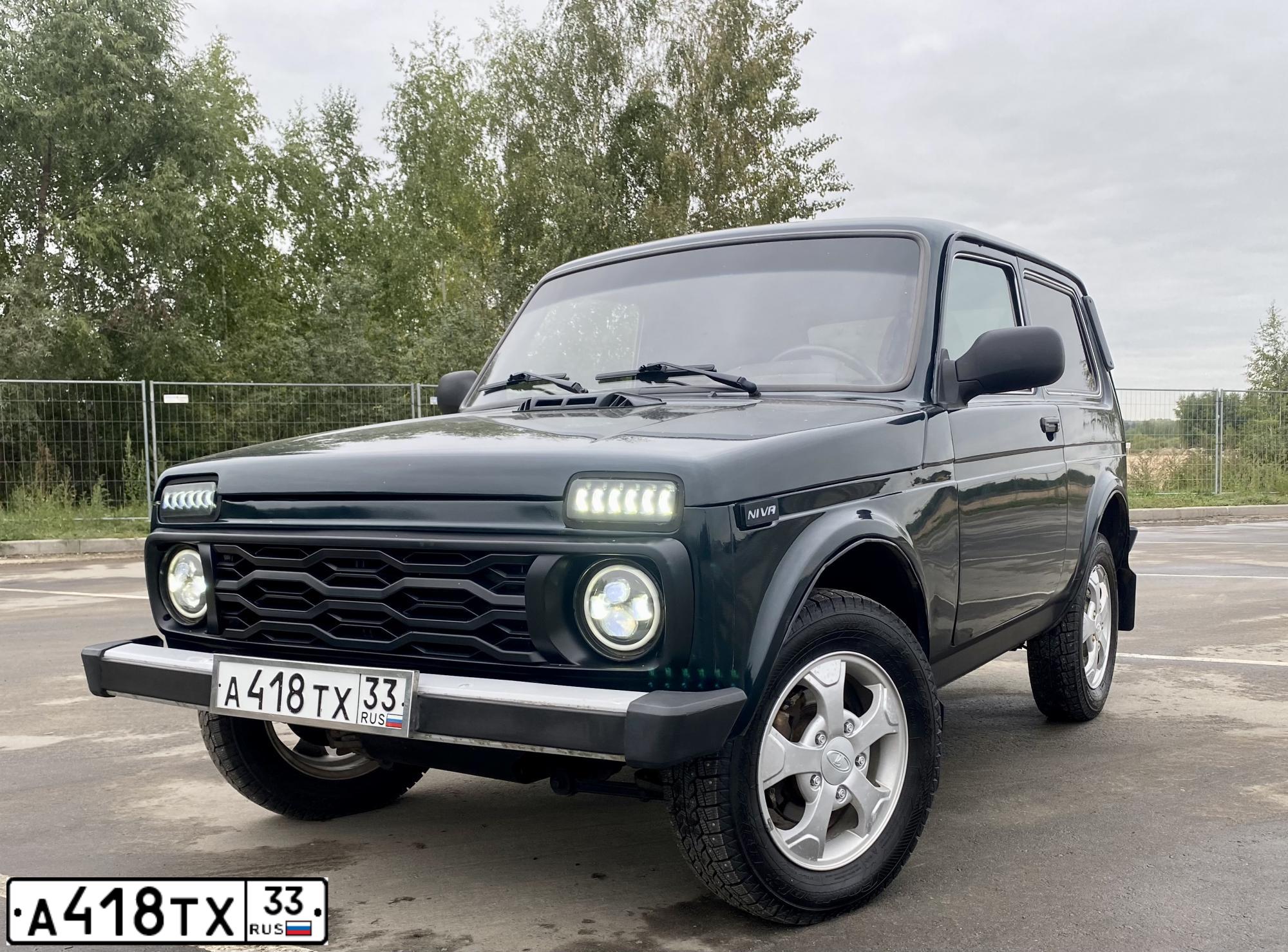 Фото автомобиля LADA NIVA, 2017 — госномер Т793ТН33. Цвет: ТЕМНО - ЗЕЛЕНЫЙ