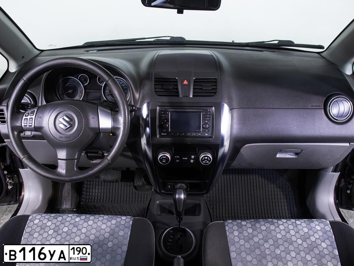 Фото автомобиля SUZUKI SX 4, 2012 — госномер В116УА190. Цвет: КОРИЧНЕВЫЙ