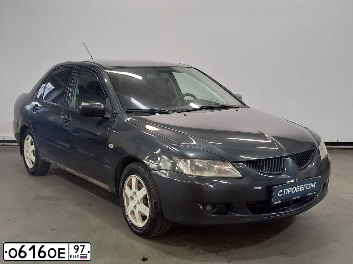 Фото автомобиля MITSUBISHI LANCER, 2004 — госномер О616ОЕ97. Цвет: СЕРЫЙ
