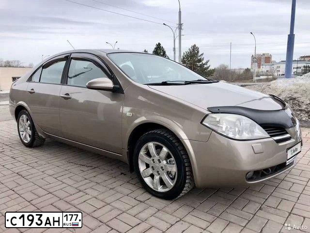 Фото автомобиля NISSAN PRIMERA, 2005 — госномер Т325АН199. Цвет: БЕЖЕВЫЙ
