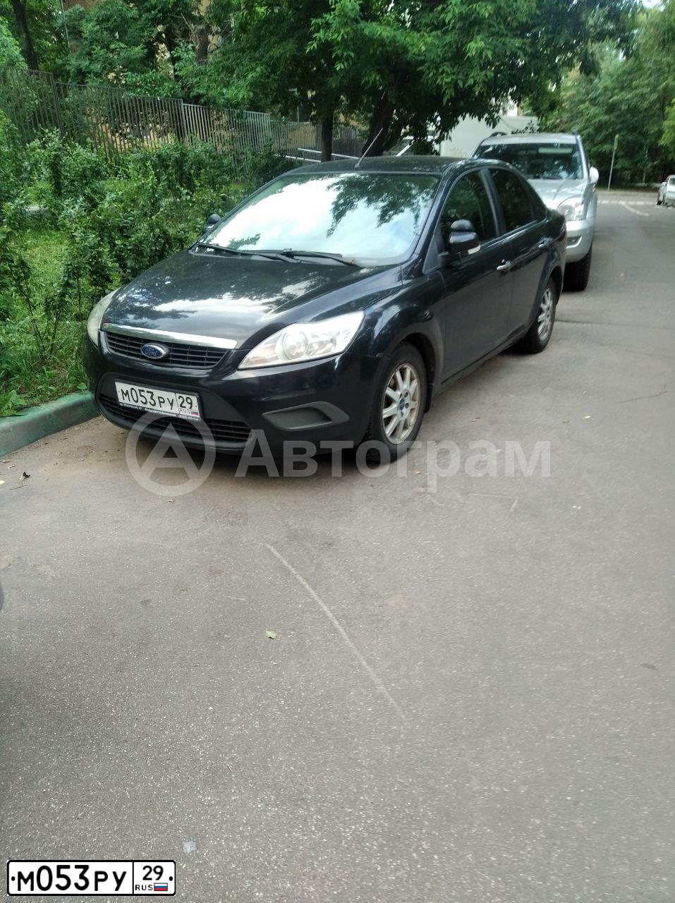 Фото автомобиля FORD FOCUS, 2008 — госномер М053РУ29. Цвет: ЧЕРНЫЙ