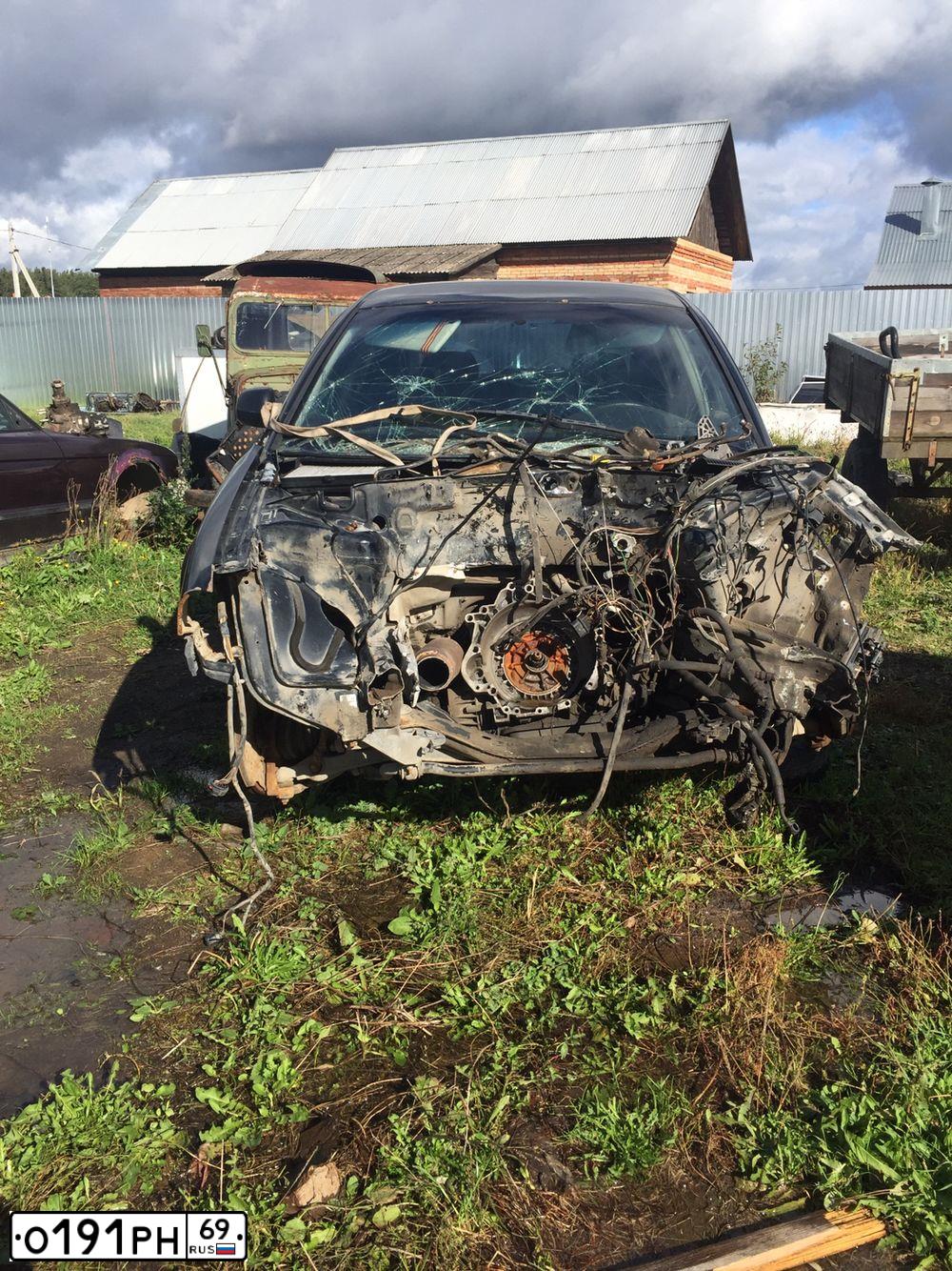 Фото автомобиля VOLKSWAGEN PASSAT, 2002 — госномер Т818НТ199. Цвет: ЧЕРНЫЙ