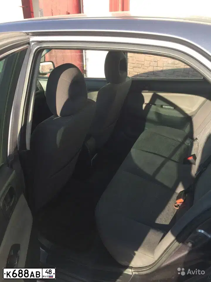 Фото автомобиля MITSUBISHI LANCER, 2004 — госномер К688АВ48. Цвет: СЕРЫЙ