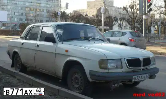 Фото автомобиля GAZ 3110 WOLGA, 1997 — госномер В771АХ62. Цвет: СЕРО-БЕЛЫЙ