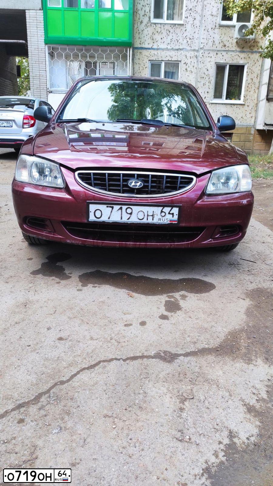 Фото автомобиля TAGAZ ACCENT, 2008 — госномер О719ОН64. Цвет: Красный