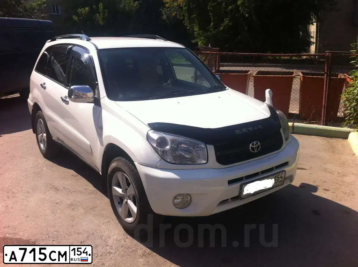 Фото автомобиля LADA 2107, 2002 — госномер А715СМ154. Цвет: ЯРКО ФИОЛЕТОВЫЙ