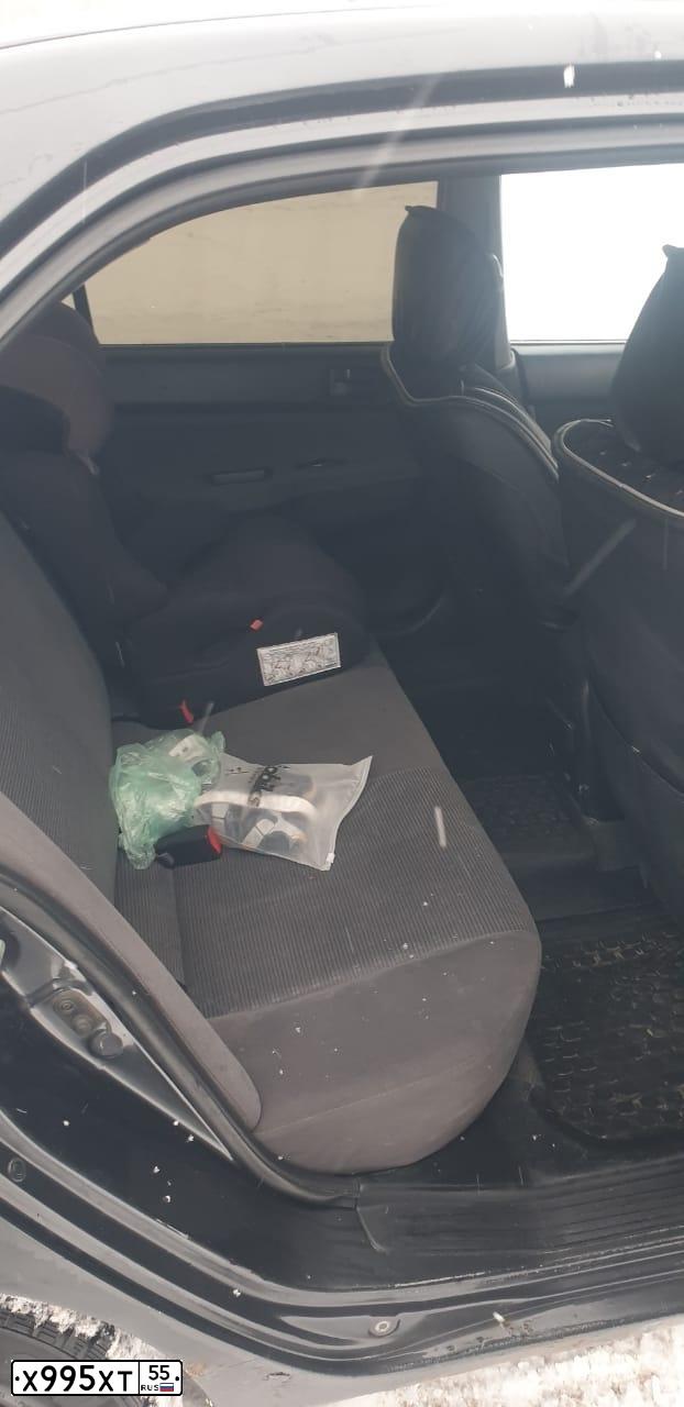 Фото автомобиля MITSUBISHI LANCER, 2004 — госномер Х995ХТ55. Цвет: СЕРЫЙ