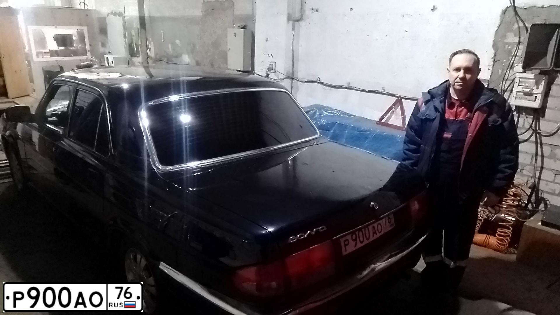 Фото автомобиля GAZ 3110, 2006 — госномер Т464НН76. Цвет: ЧЕРНЫЙ