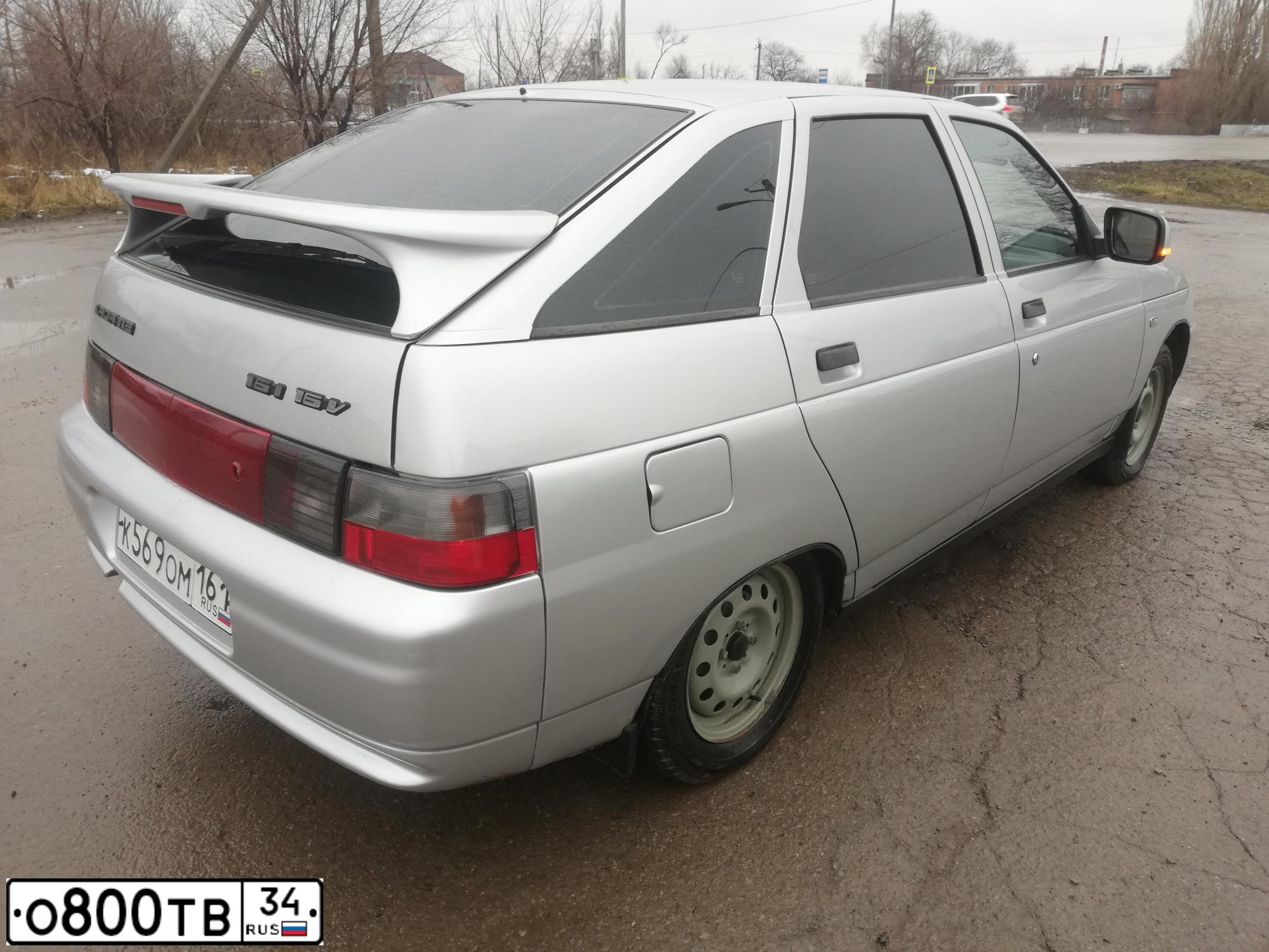 Фото автомобиля LADA 2112 LADA, 2004 — госномер К569ОМ161. Цвет: Светло-Серебристый металлик