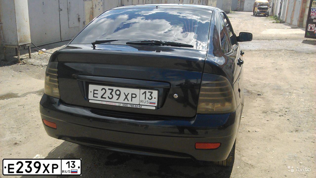 Фото автомобиля LADA 2172 PRIORA, 2008 — госномер Е239ХР13. Цвет: Темно-зеленый