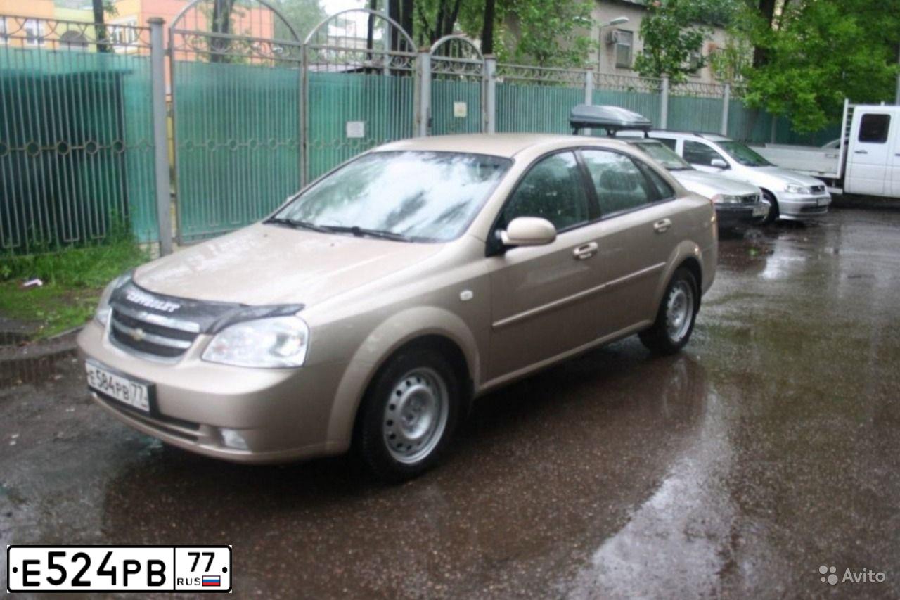 Фото автомобиля CHEVROLET NIVA, 2013 — госномер О167ТН69. Цвет: Серо-коричневый металлик