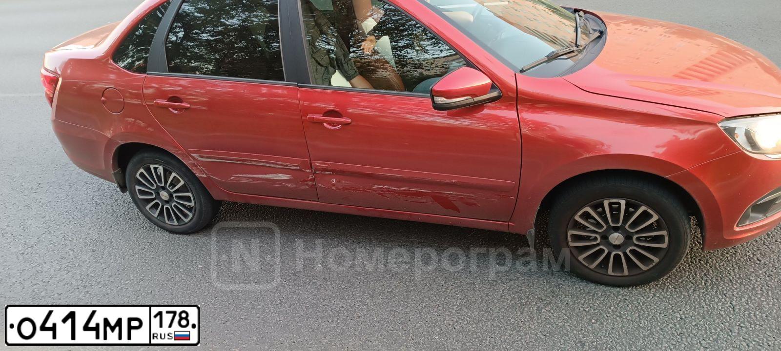 Фото автомобиля LADA 2190 GRANTA, 2013 — госномер О414МР178. Цвет: СЕРЕБРИСТО-КРАСНЫЙ