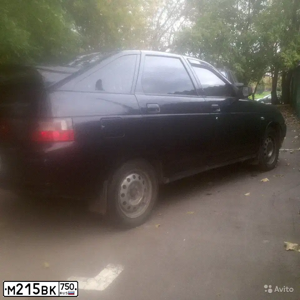 Фото автомобиля LADA 2112, 2004 — госномер М215ВК750. Цвет: ЧЕРНЫЙ