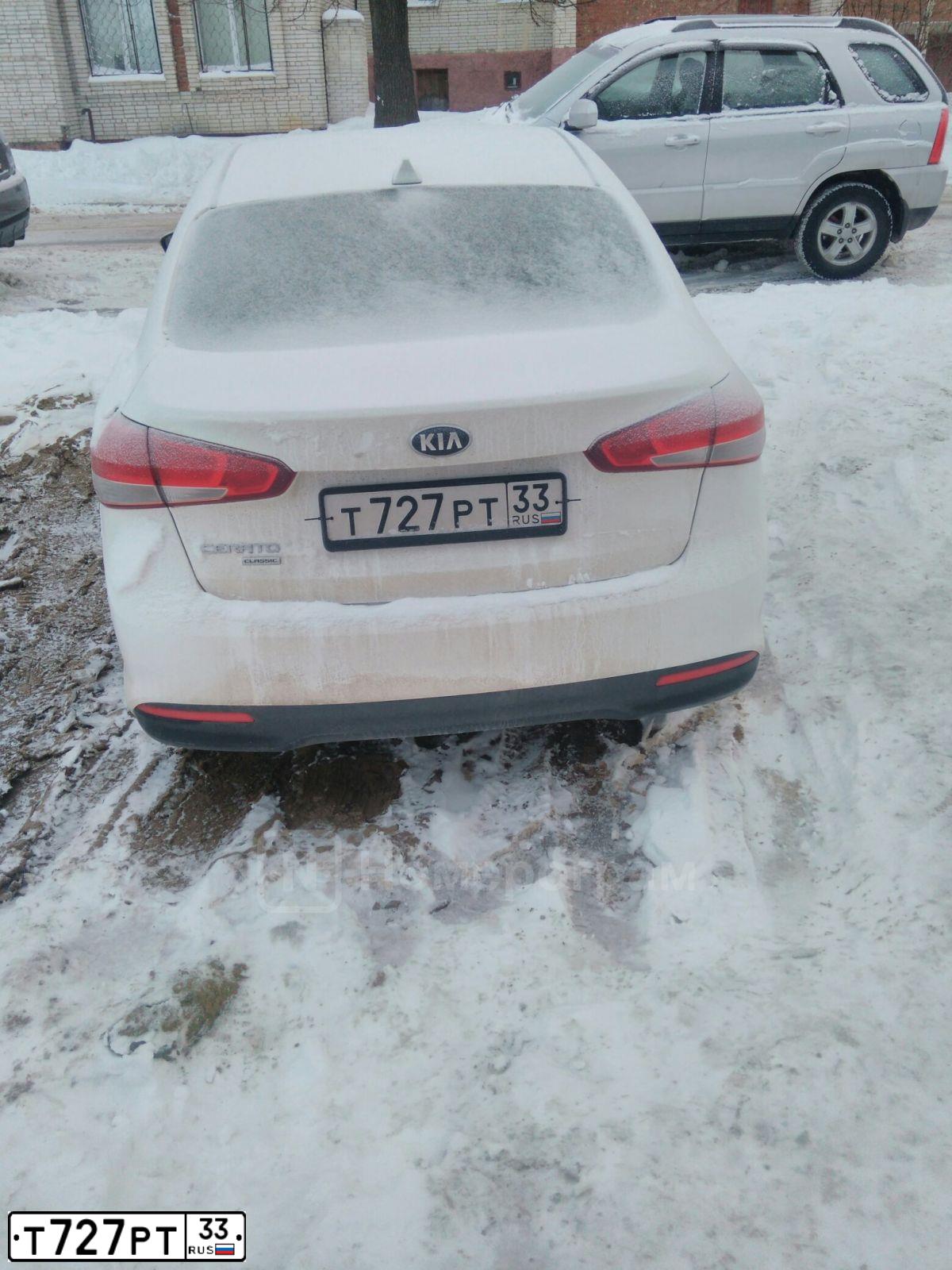 Фото автомобиля KIA CERATO, 2019 — госномер К173УЕ33. Цвет: Белый