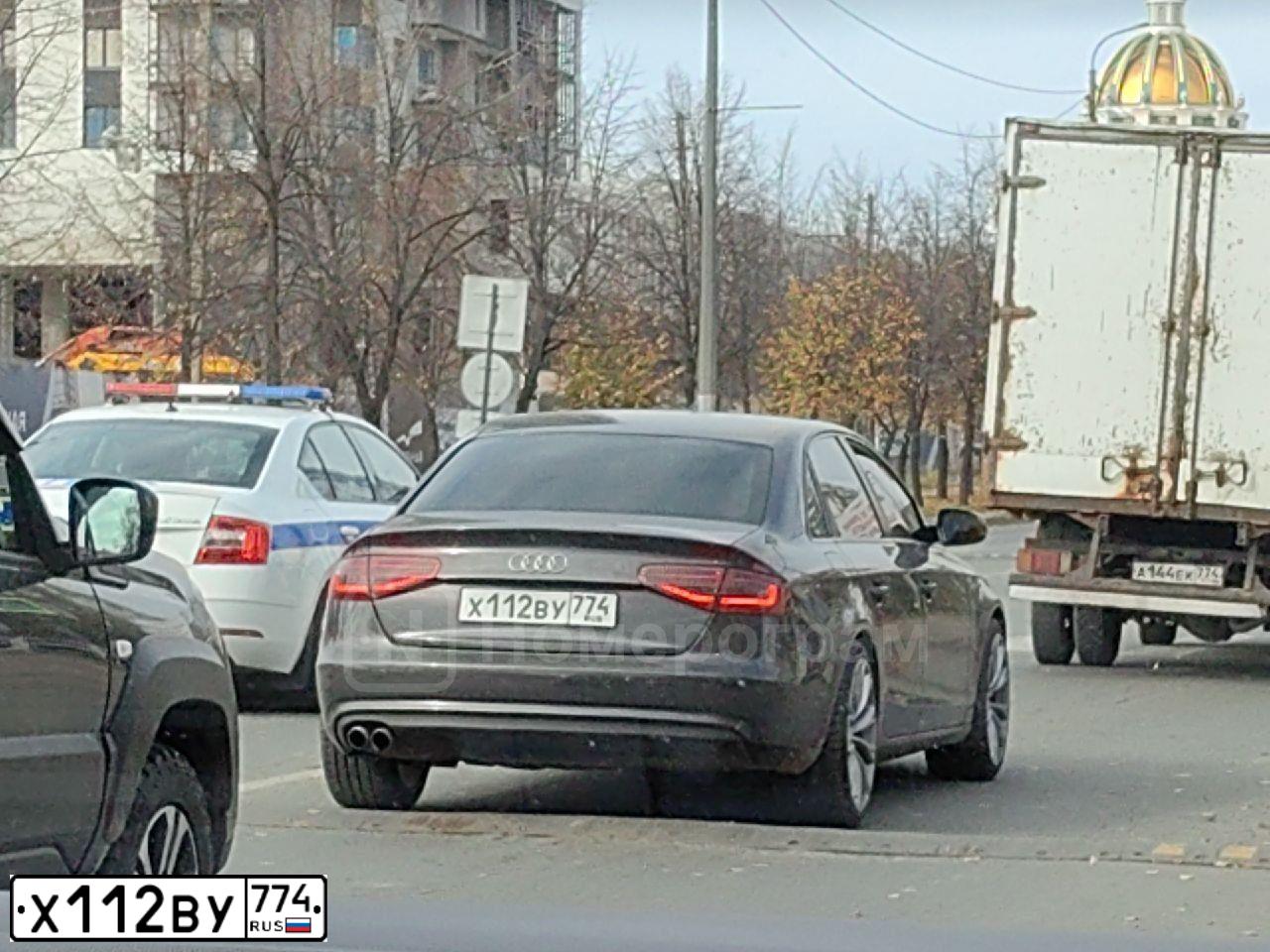 Фото автомобиля AUDI A4, 2013 — госномер Х112ВУ774. Цвет: ЧЕРНО-СЕРЫЙ