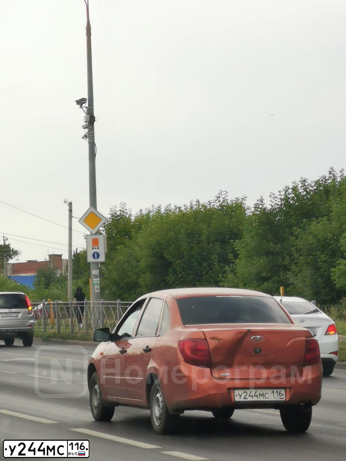 Фото автомобиля LADA 2190 GRANTA, 2014 — госномер У244МС116. Цвет: ОРАНЖЕВЫЙ