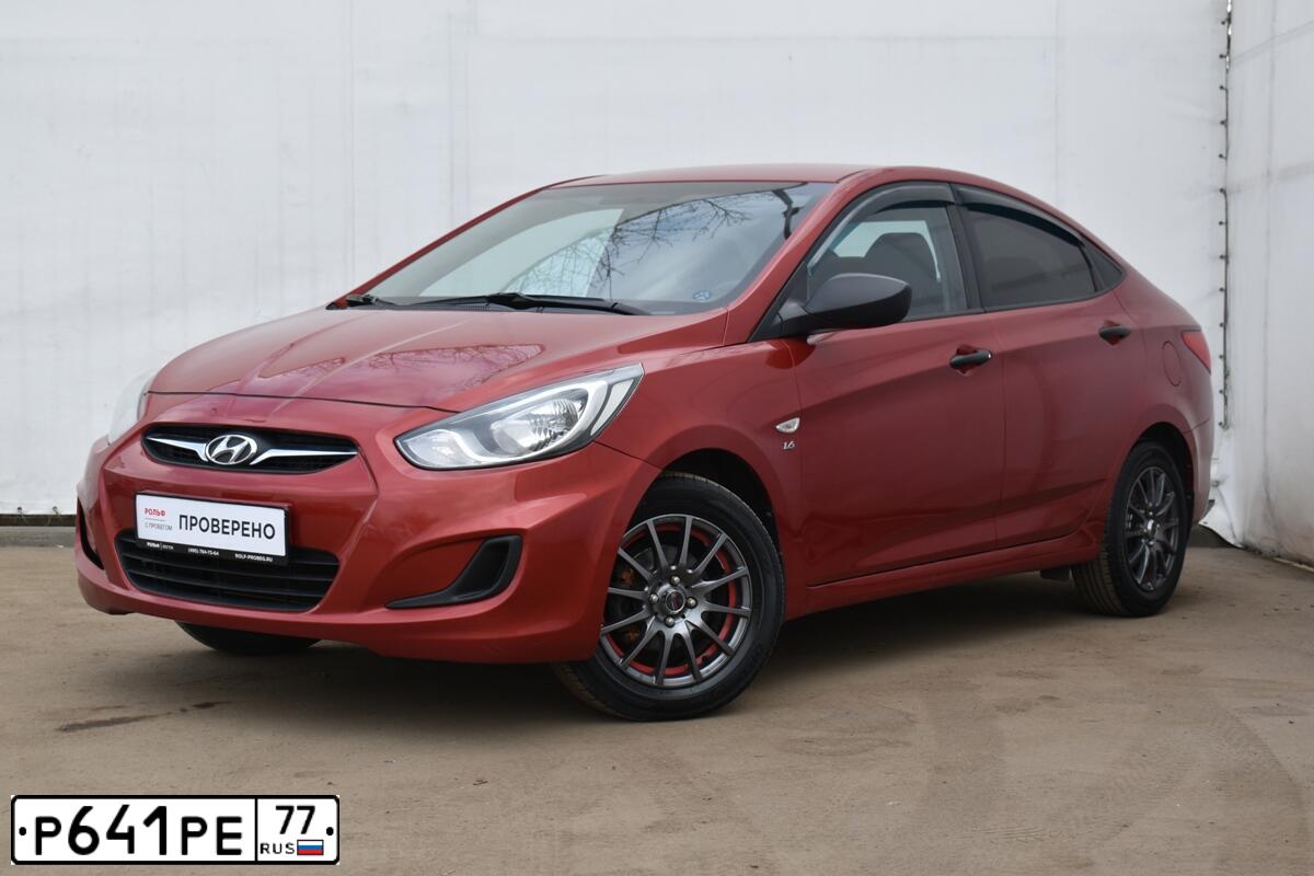 Фото автомобиля HYUNDAI SOLARIS, 2013 — госномер У565ТХ33. Цвет: КРАСНЫЙ ГРАНАТ