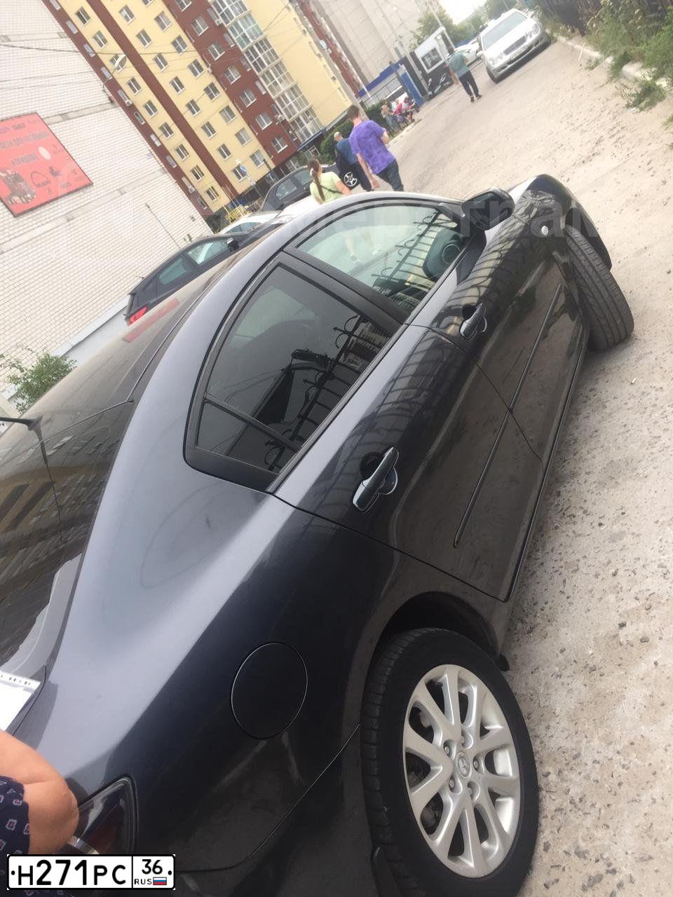 Фото автомобиля MAZDA 3, 2008 — госномер Х084ВТ31. Цвет: СЕРЫЙ
