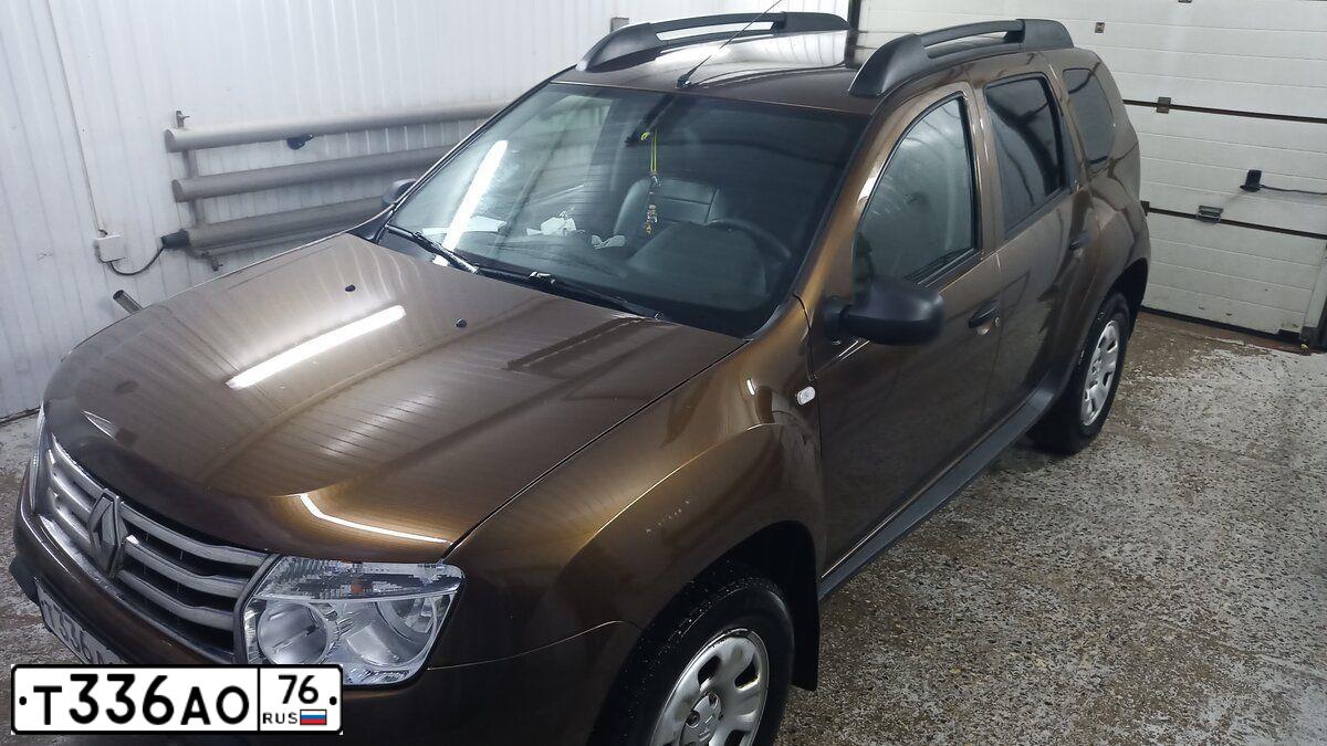 Фото автомобиля RENAULT DUSTER, 2014 — госномер В258МЕ37. Цвет: Коричневый