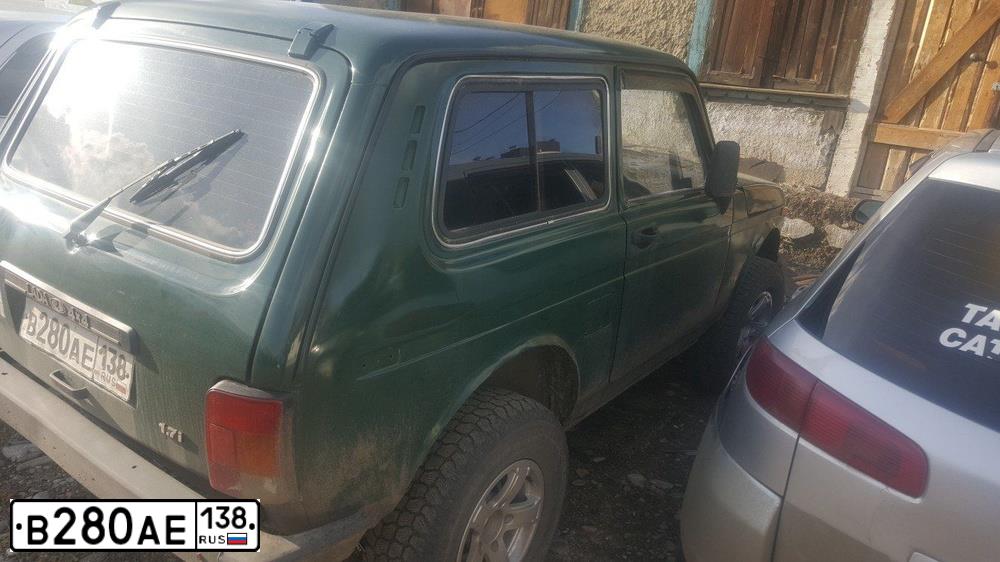 Фото автомобиля LADA 2121 NIVA, 1999 — госномер В280АЕ138. Цвет: ЗЕЛЕНЫЙ