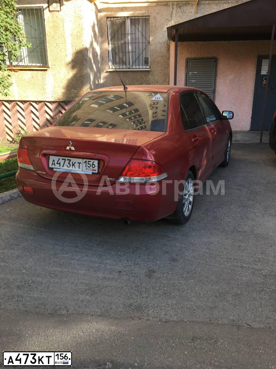 Фото автомобиля MITSUBISHI LANCER, 2005 — госномер А473КТ156. Цвет: Красный
