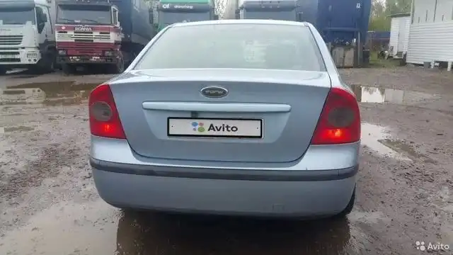 Фото автомобиля FORD FOCUS, 2005 — госномер Е730ЕВ46. Цвет: Светло-Серо-Голубой
