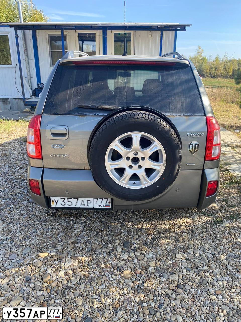 Фото автомобиля CHERY TIGGO, 2013 — госномер М112ЕР180. Цвет: Серый