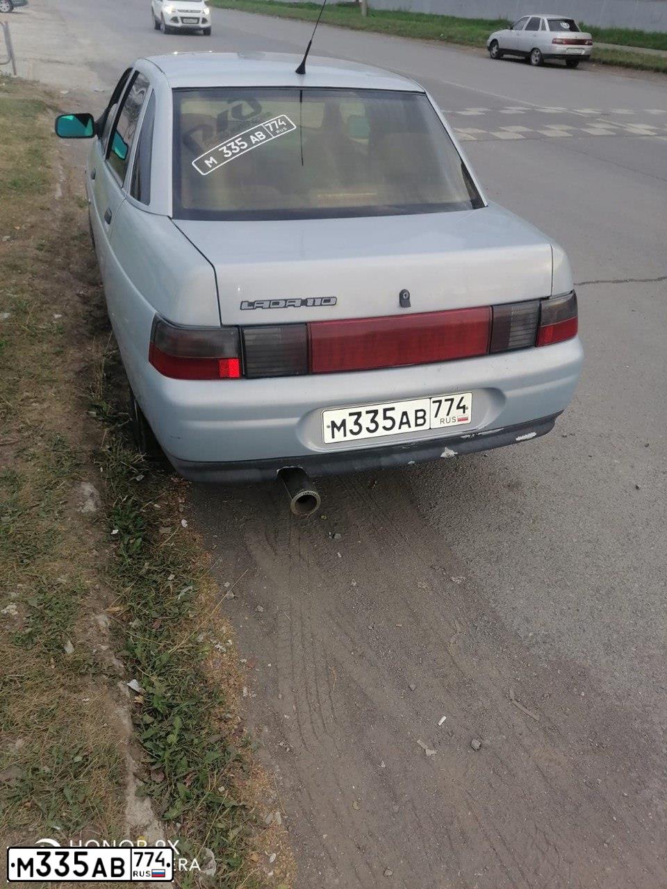 Фото автомобиля LADA 2110, 2004 — госномер М335АВ774. Цвет: СЕРЕБРИСТО ЖЕЛТЫЙ